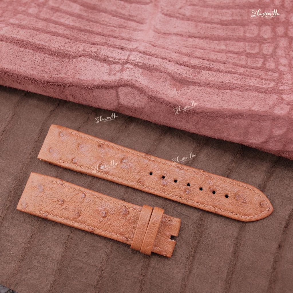 DSCF6398 | CustomHu: Luxury Custom Watch Straps Jaeger LeCoultre Grande Reverso Straps Tan ostrich-textured leather watch strap in two pieces with buckle and multiple holes, laid on a brown fabric surface.